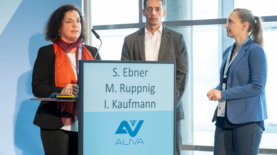 Vortragende der AUVA hinter dem Rednerpult